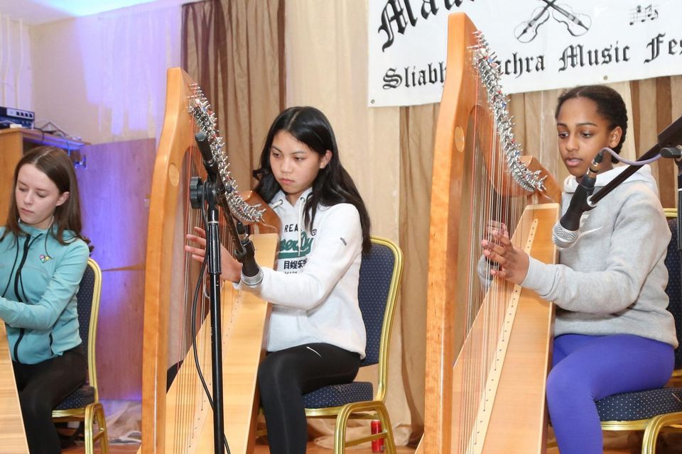 Muireann O’ Hanlon and sisters Mahilet and Vy-ha O’ Leary were first on stage at the launch Concert of the Maurice O’ Keeffe Traditional Music Festival in Kiskeam