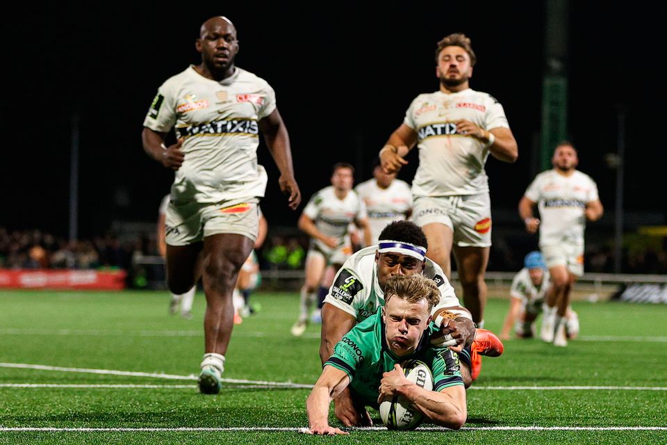 Connacht's Ben Murphy scores a try despite the efforts of Vinaya Habosi of Racing 92 during the Challenge Cup quarter-final at Dexcom Stadium in Galway. Photo: Thomas Flinkow/Sportsfile