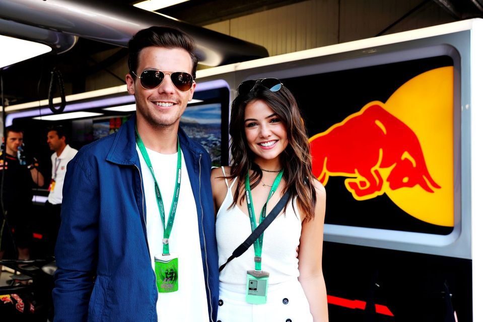 Louis Tomlinson, singer, with girlfriend Danielle Campbell at the Red Bull Racing garage during qualifying for the Monaco Formula One Grand Prix at Circuit de Monaco on May 28, 2016 in Monte-Carlo, Monaco.  (Photo by Mark Thompson/Getty Images)