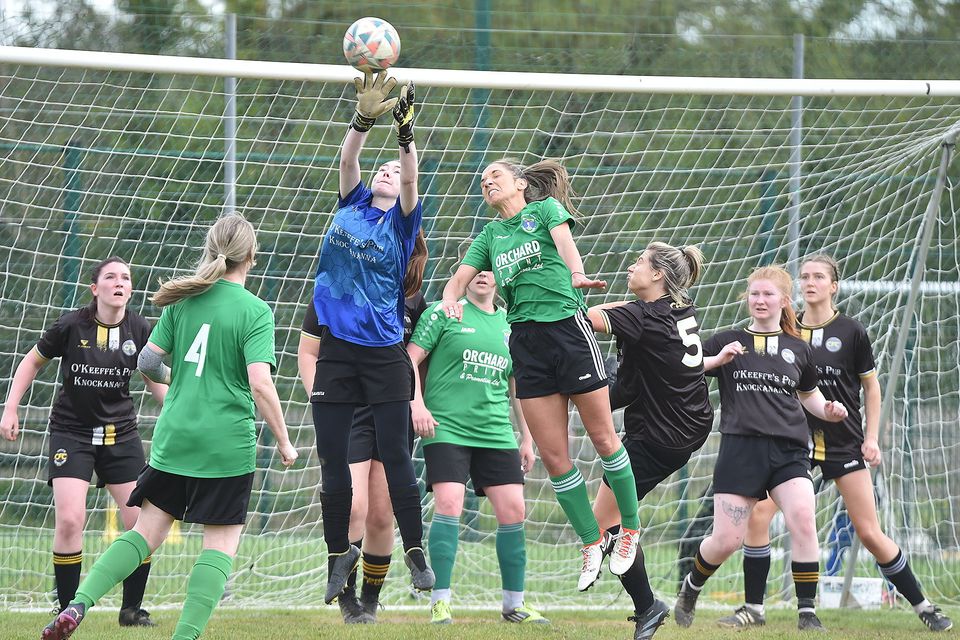 Carnew FC's goalie Leanne Walsh ends an Wicklow Rovers attack. 