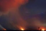 thumbnail: Lava shoots into the night sky from active fissures on the lower east rift of the Kilauea volcano, Tuesday, May 15, 2018 near Pahoa, Hawaii. (AP Photo/Caleb Jones)