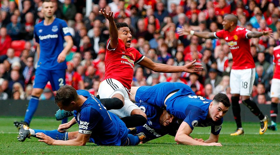 Manchester United's Jesse Lingard in action with Everton's Ashley Williams, Phil Jagielka and Michael Keane. Photo: Reuters/Andrew Yates