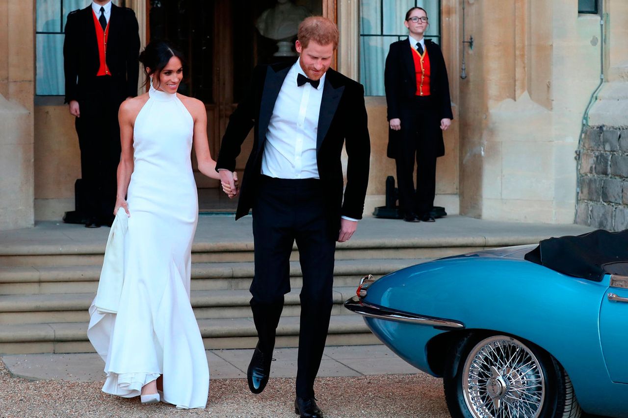 Meghan Markle changes into bespoke Stella McCartney gown as she and Prince Harry drive off to VIP reception in Jaguar Irish Independent