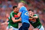 thumbnail: Eoghan O'Gara of Dublin in action against Jason Doherty, left, and Brendan Harrison of Mayo during the GAA Football All-Ireland Senior Championship Final match between Dublin and Mayo at Croke Park in Dublin.