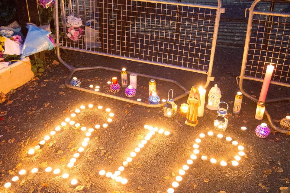A candle-lit tribute to the 10 dead