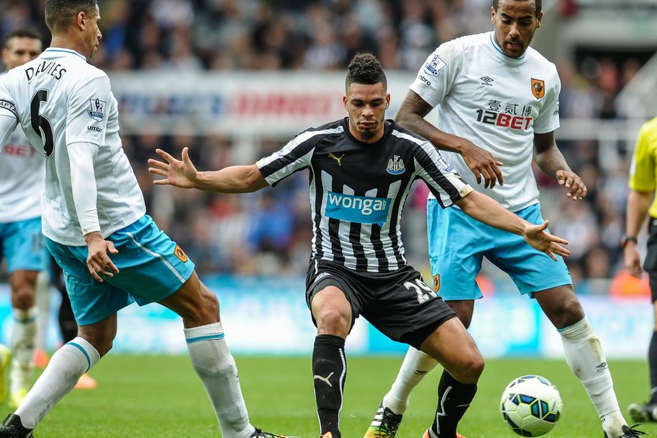 Newcastle United's Emmanuel Riviere looks to close down a pass from Hull City's Curtis Davies during the Premier League game at St.James' Park. Photo: Serena Taylor/Newcastle United via Getty Images