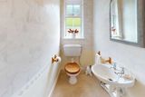 thumbnail: One of the bathrooms in the property.