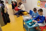 thumbnail: Pupils learning in a corridor at Fermoy Educate Together