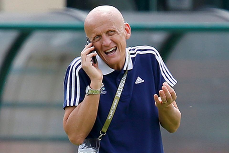 Pierluigi Collina, the UEFA Chief Refereeing Officer, speaks on his mobile phone during an official Euro 2012 referee training in Warsaw. Photo: Reuters