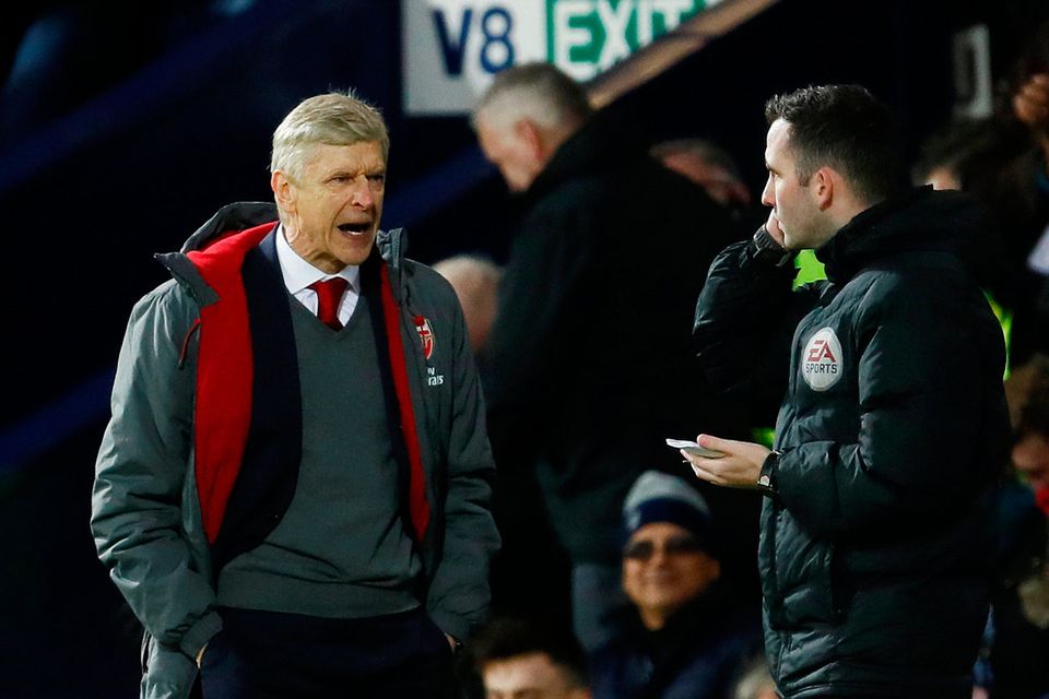 Soccer Football - Premier League - West Bromwich Albion vs Arsenal - The Hawthorns, West Bromwich, Britain - December 31, 2017   Arsenal manager Arsene Wenger remonstrates with the fourth official      Action Images via Reuters/Jason Cairnduff