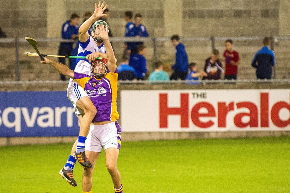 Barry O'Rorke, Crokes, battle for a high cliotar against Ciaran Harney, Vincent's.