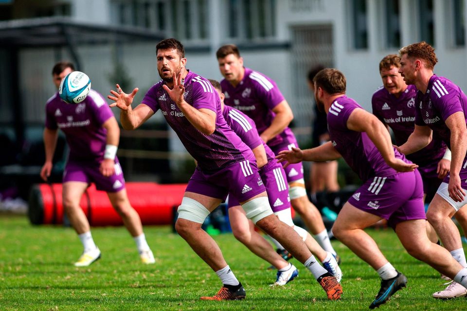 Jean Kleyn receives the ball during a Munster Rugby squad training session at Hamilton RFC in Cape Town, South Africa