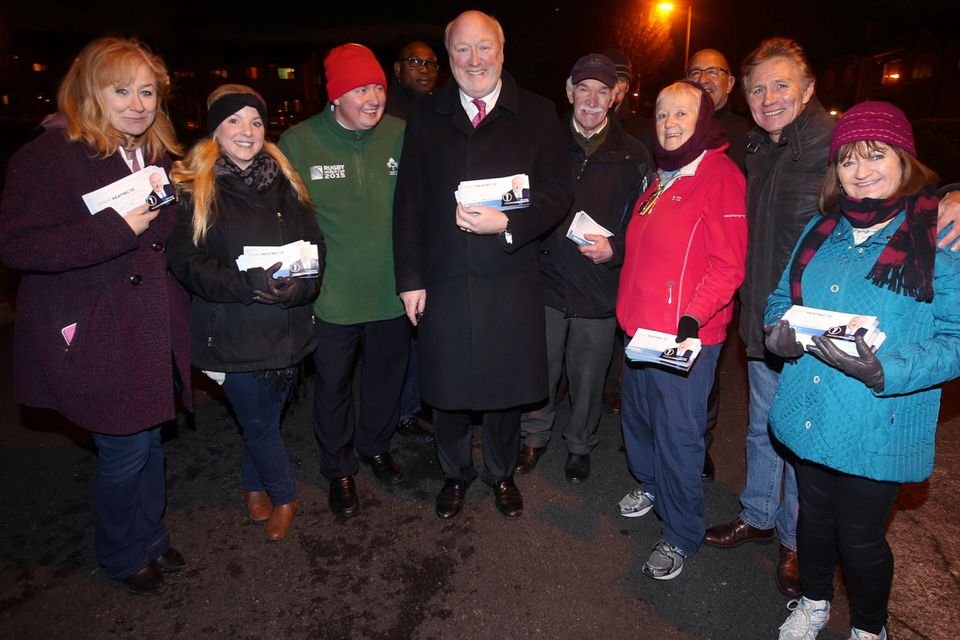 Derek Keating (centre) surrounded by helpers on the canvass, including Senator Eamonn Coghlan (second right) in Lucan