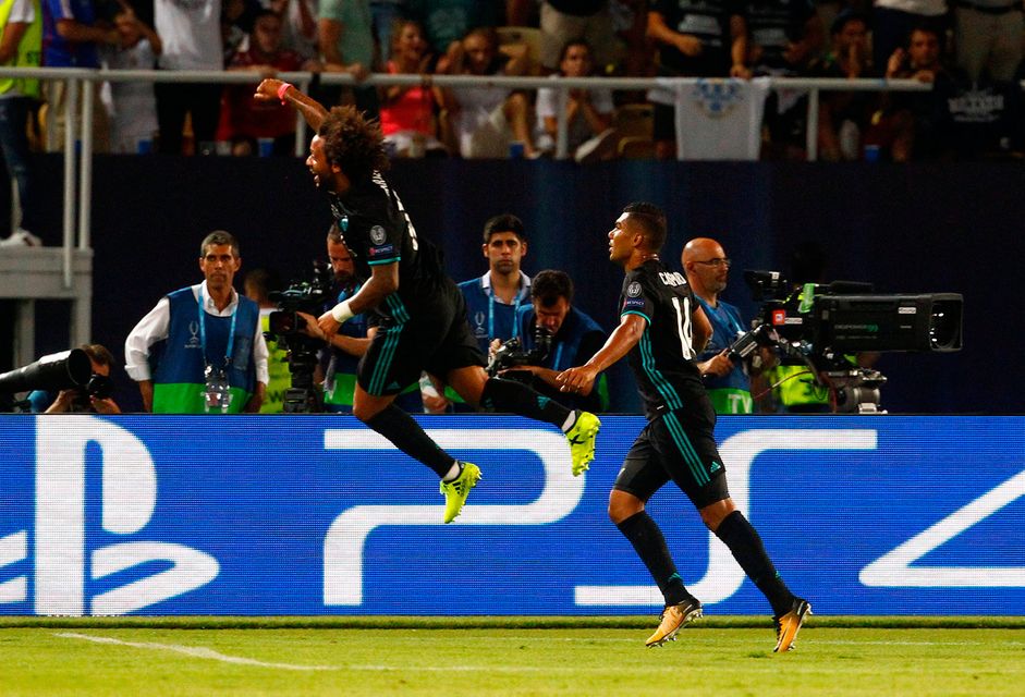 Real Madrid’s Casemiro celebrates scoring their first goal with Marcelo Photo: REUTERS/Ognen Teofilovski
