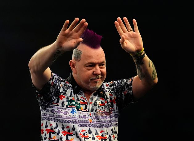 Reigning champion Luke Humphries beaten in fourth round of World Darts Championship by Peter Wright