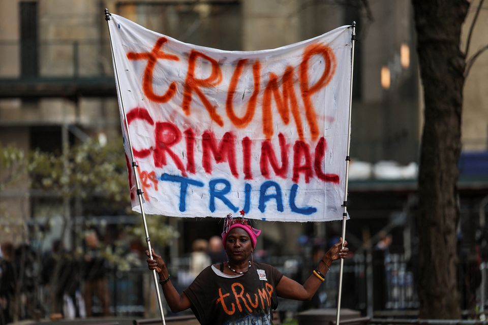 Nadine Seiler protests outside the courthouse in New York on the day of Donald Trump's hush money criminal trial in New York City. Photo: Shannon Stapleton/Reuters