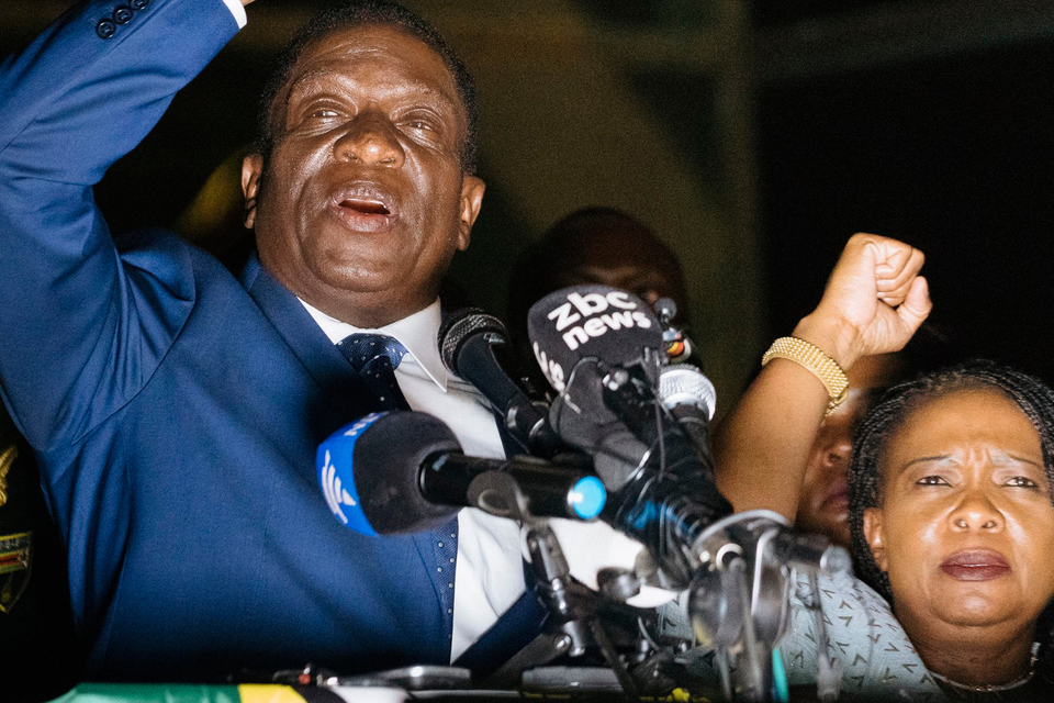 Zimbabwe’s incoming president Emmerson Mnangagwa speaks to supporters, flanked by his wife Auxilia, at Zimbabwe’s ruling Zanu-PF party headquarters in Harare. Photo: Getty Images