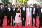 thumbnail: Irish actor Simon Delaney, US actor Judd Hirsch, US actor Sean Penn, Irish actress Eve Hewson, Italian director Paolo Sorrentino, Scottish born musician David Byrne, Israeli actor Liron Levo and German actor Heinz Lieven pose  on the red carpet before the screening of "This Must Be The Place" presented in competition at the 64th Cannes Film Festival on May 20, 2011 in Cannes.