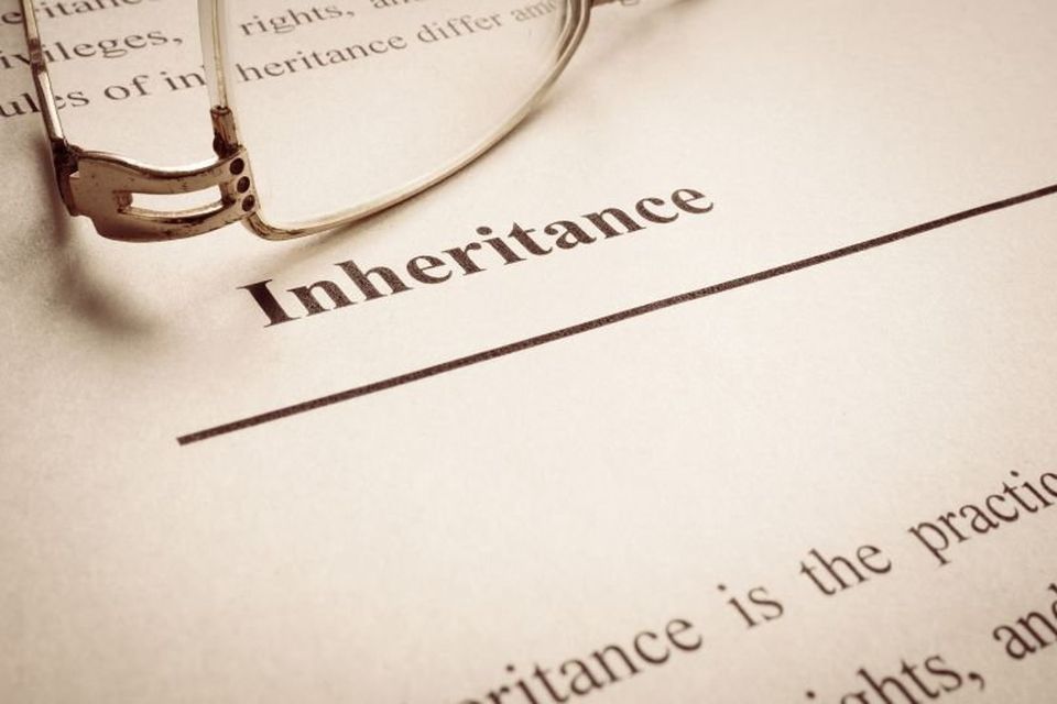 Inheritance tax is a death tax levied on legally acquired savings and assets. Stock image