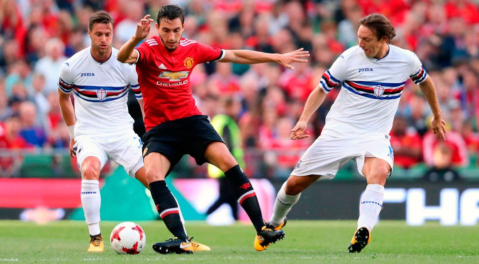 Manchester United's Matteo Darmian (centre) battles for the ball with Sampdoria's Jacopo Sala (left) and Edgar Barreto. Photo credit: Niall Carson/PA Wire