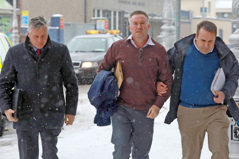 Michael Lynn (centre) arriving at the Criminal Courts of Justice earlier this yearPhoto: Paddy Cummins/PCPhoto.ie