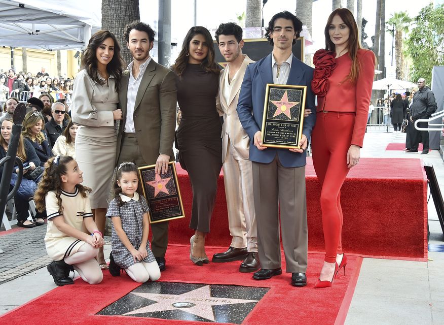 Jonas Brothers inducted into Hollywood Walk of Fame with their wives by  their sides - ABC News