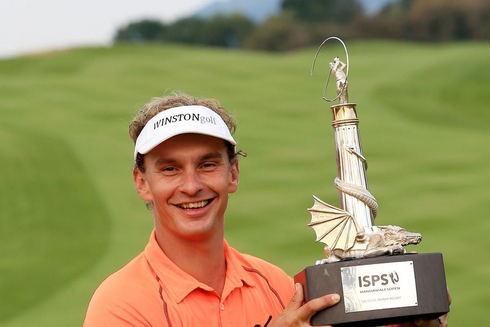 Netherlands Joost Luiten holds the trophy after winning The ISPS Handa Welsh Open, during day four of the 2014 ISPS Handa Welsh Open at Celtic Manor, Newport.