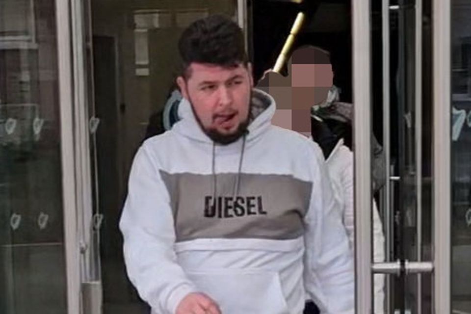 Simon McGinley (25) also threw a plastic pint glass at the car.