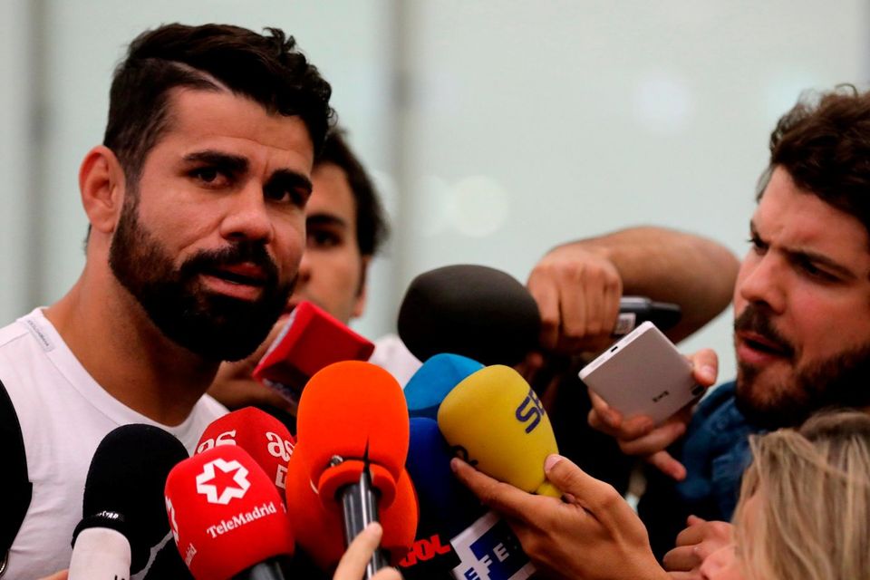 Diego Costa speaks to media upon arriving at Adolfo Suarez Madrid Barajas airport