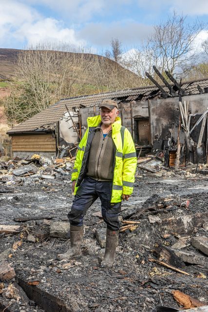 Pieter J Bot at the site where his house burnt to the ground on Good Friday. Photo by Michael Donnelly.