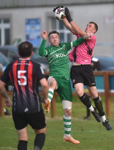 Ballymurn Celtic's Eoghan Kehoe puts pressure on Fasnet Rovers goalkeeper Rory O'Brien. Photo: Jim Campbell