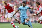 thumbnail: Manchester City's Sergio Aguero (right) is challenged by Arsenal's Per Mertesacker and Mathieu Debuchy