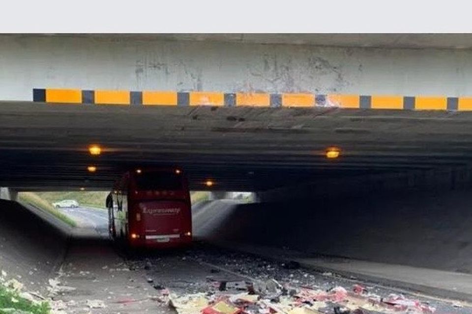 A Bus Éireann bus became stuck under a low bridge outside Waterford city