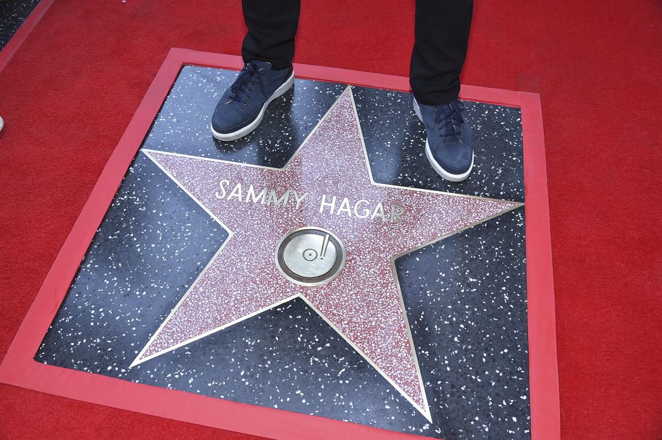 Sammy Hagar stands on his new star during a ceremony honoring Him with a star on the Hollywood Walk of Fame (Richard Shotwell/Invision/AP)