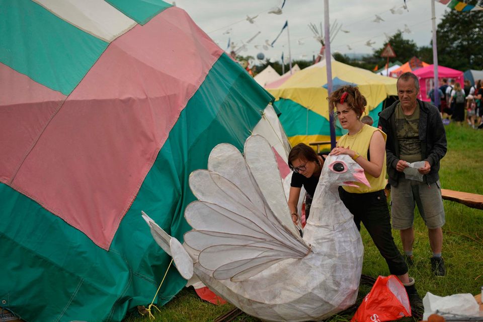 Revellers do craft at the Glastonbury Festival of Music and Performing Arts on Worthy Farm near the village of Pilton in Somerset, South West England, on June 26, 2019. (Photo by Oli SCARFF / AFP)OLI SCARFF/AFP/Getty Images