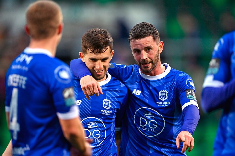 Waterford players Pádraig Amond, right, and Dean McMenamy celebrate after their side's victory in the SSE Airtricity Premier Division win over Shamrock Rovers at Tallaght Stadium in Dublin. Photo: Piaras Ó Mídheach/Sportsfile