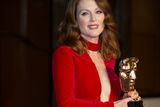 thumbnail: Julianne Moore with her Best Actress Award as she attends the after show party for the EE British Academy Film Awards at the Grosvenor House Hotel in central London. PRESS ASSOCIATION Photo. Picture date: Sunday February 8, 2015. See PA story SHOWBIZ Bafta. Photo credit should read: Daniel Leal-Olivas/PA Wire