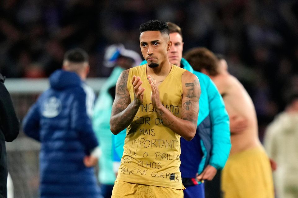 Barcelona's Raphinha wears a message in support of Vinicius Jr after the LaLiga match against Real Valladolid at Estadio Municipal Jose Zorrilla last night.