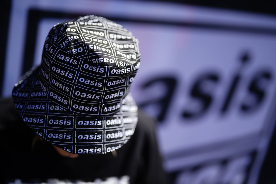 There were plenty of bucket hats on view as the Oasis Live 25 tour kicked off in Cardiff (Jordan Pettitt/PA)
