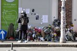 thumbnail: Flowers and candles left at the scene on Aungier Street where Ann Delaney regularly sat. Photo: Sam Boal/Collins