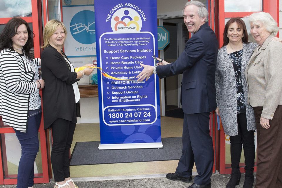 John Lonergan cuts the ribbon on the ‘Care Cafe’, with Gina Delahunty, Catherine Cox, Lorraine Ryan and Mary Murphy