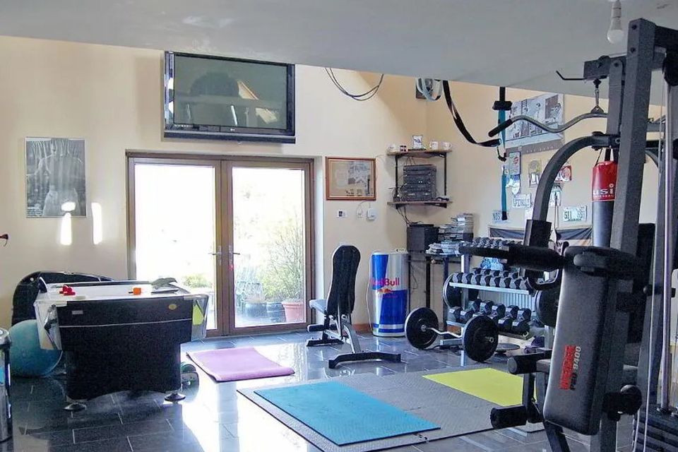 One of the garages is being used as a home gym