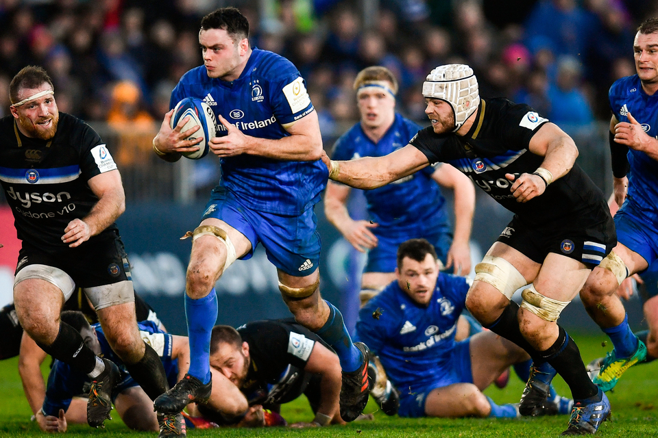 James Ryan on the charge for Leinster, trying to escape the clutches of Bath’s Dave Attwood (right), during Saturday’s Champions Cup clash at The Rec. Photo: Sportsfile