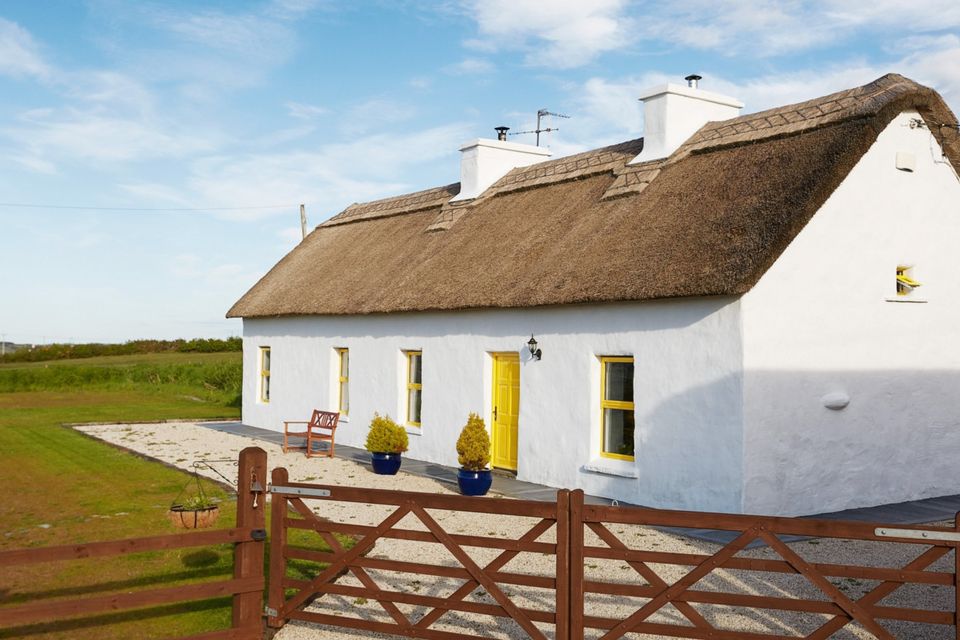 Thatch cottage has been restored and is in pristine condition.