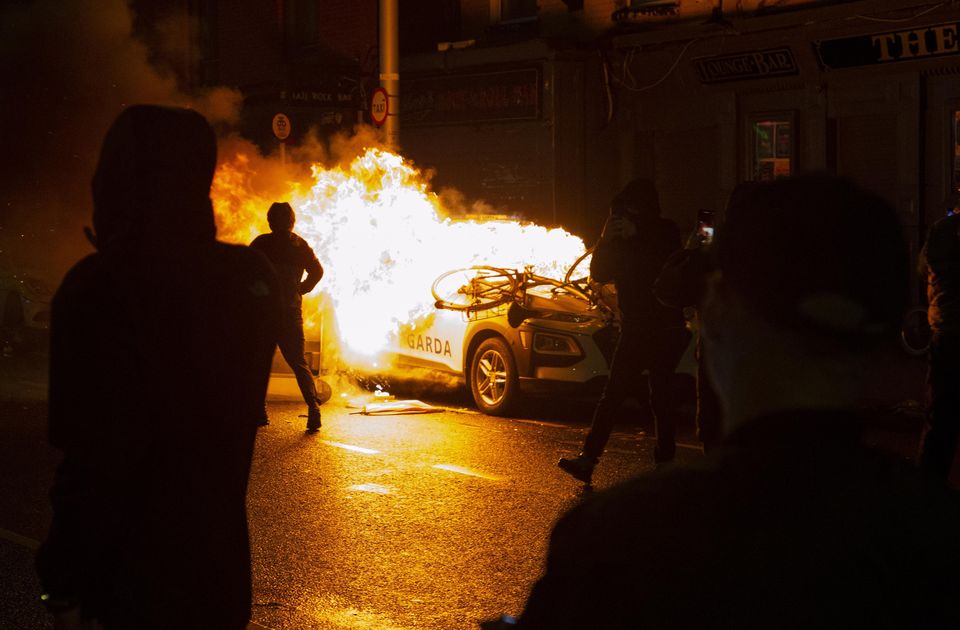 A garda car on fire in Dublin