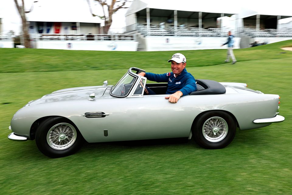 Pádraig Harrington drives in a miniature Aston Martin after winning the Hoag Classic at Newport Beach. Photo: Michael Owens/Getty Images