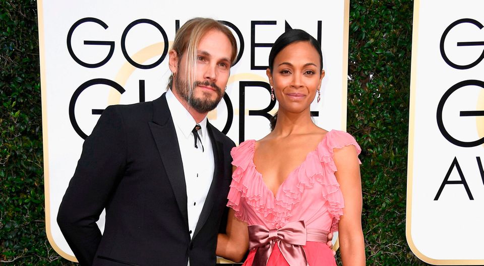 Actress Zoe Saldana (R) and Marco Perego attend the 74th Annual Golden Globe Awards at The Beverly Hilton Hotel on January 8, 2017 in Beverly Hills, California.  (Photo by Frazer Harrison/Getty Images)