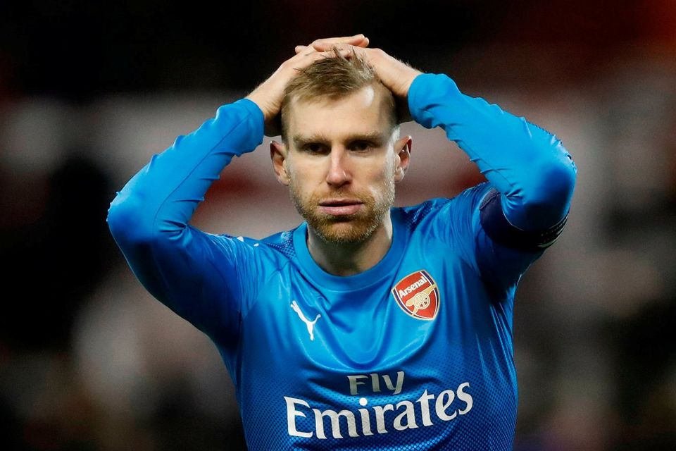 Arsenal's Per Mertesacker reacts during the defeat.    Action Images via Reuters/Carl Recine