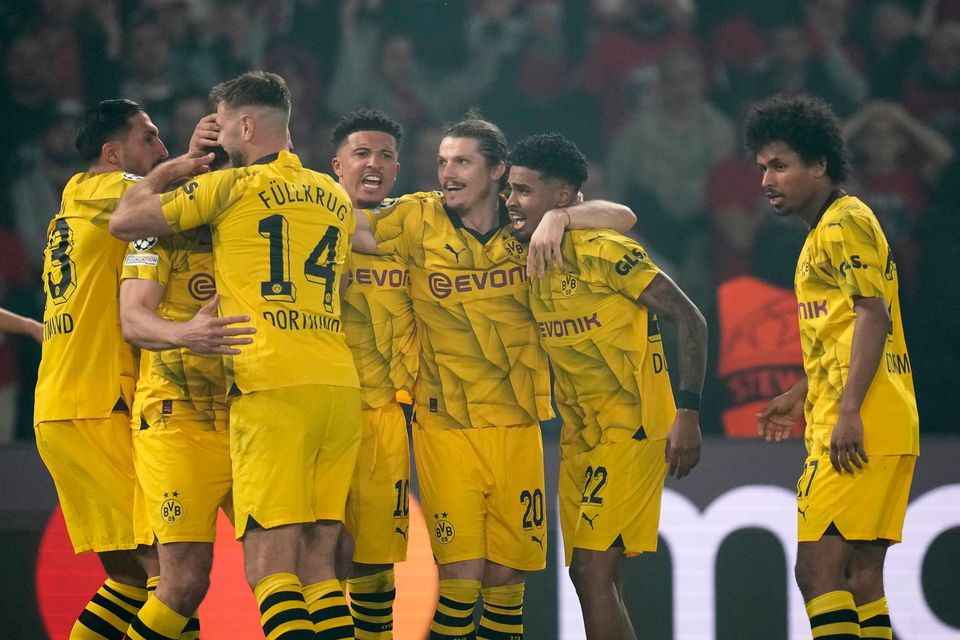 Dortmund's Mats Hummels celebrates with teammates after scoring his side's goal during the Champions League semi-final second leg win over Paris Saint-Germain at the Parc des Princes stadium in Paris