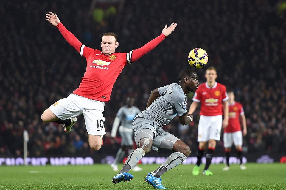 Wayne Rooney, left, enjoyed the role of leading Manchester United's midfield against Newcastle